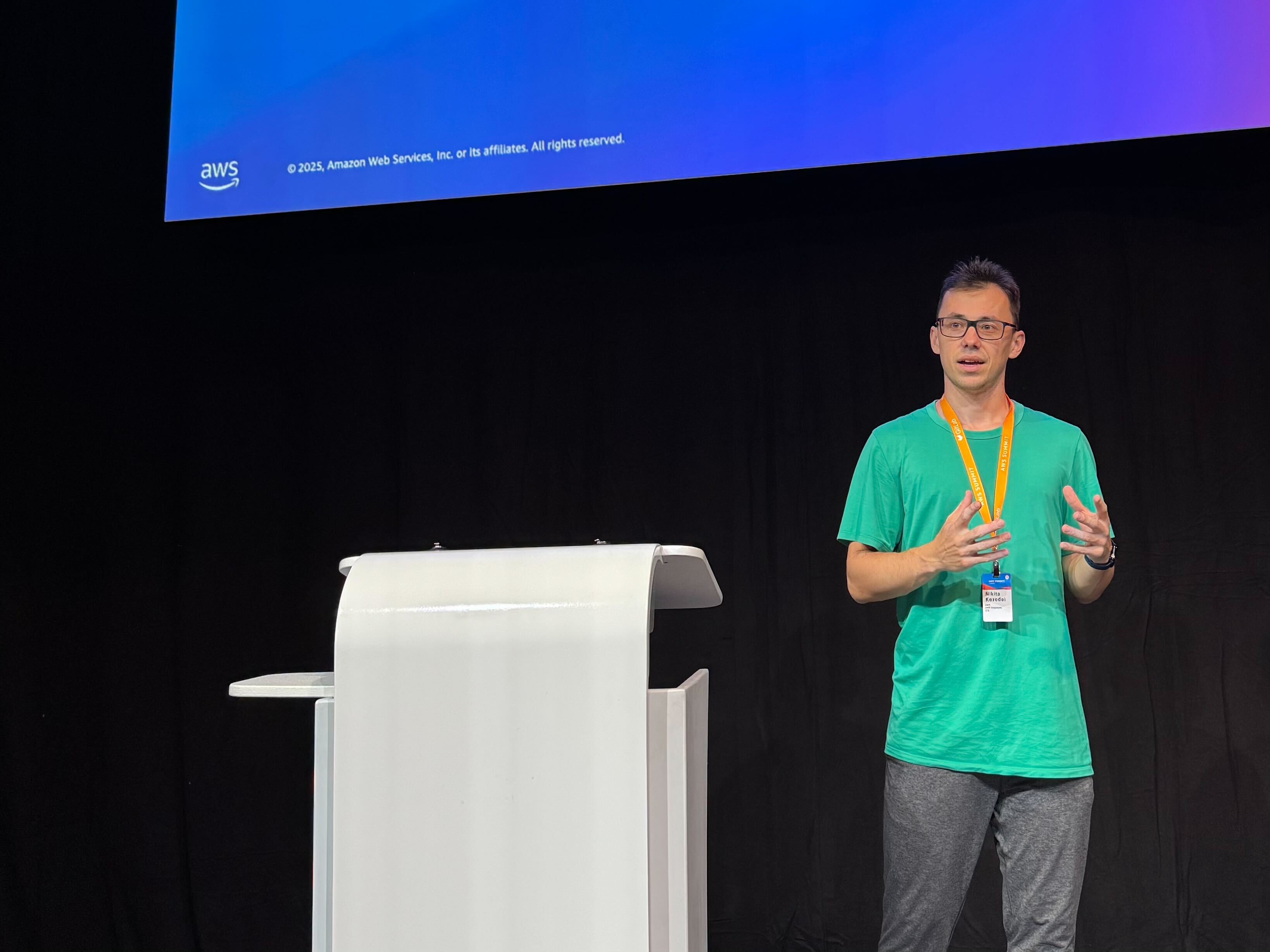 Nikita Kozodoi presenting at an AI conference